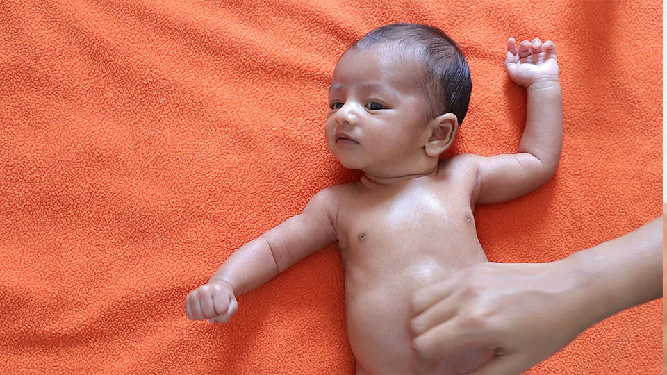 Soothing Baby's Tummy Troubles with Baby Oil Massage